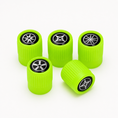 Five fluorescent green car tyre valve caps with wheel emblems
